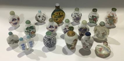 A collection of Chinese snuff bottles, various forms including inside painted, polychrome painted