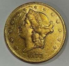 Coins - an American gold $20 coin, eagle and crest, 1877