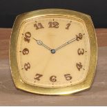 An Art Deco gilt brass easel strut timepiece, 8.5cm clock dial inscribed with luminous Arabic