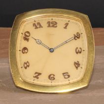 An Art Deco gilt brass easel strut timepiece, 8.5cm clock dial inscribed with luminous Arabic