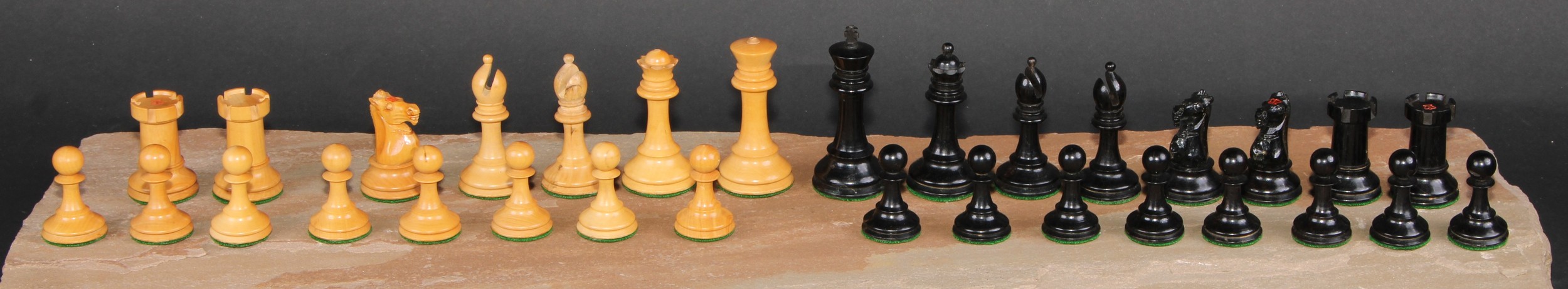 A boxwood and ebonised Staunton chess set, marked for King’s side, the Kings 7cm high, mahogany box - Image 2 of 4