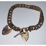 A 9ct gold fancy link bracelet with lockets, approximately 17g