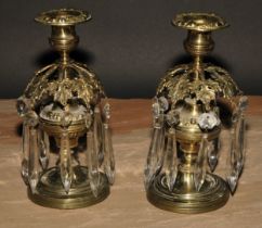 A pair of post Regency candle lustres, each campana sconce above a band of vine leaves, faceted