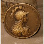 A bronze medalion, struck after a Louis XIV issue of 1674, designed by Francois Varin (1644 - 1705),