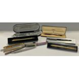 A collection of fourteen pens and pencils, various makers, including Cross Saab Scania, etc, some