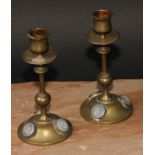 A pair of 19th century jasperware mounted brass candlesticks, the cabochons sprigged in the Grand