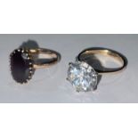 A 9ct gold solitaire ring, stamped '9ct' for 9ct gold, the central brilliant cut stone claw set,