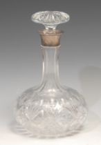 A George V silver mounted cut glass mallet shaped decanter, mushroom stopper, 23cm high,