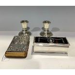 A pair of silver boudoir candlesticks, 6cm high, Birmingham 1971; a silver, tortoiseshell and