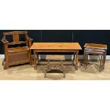 An oak hall settle or bench, of small proportions, hinged seat, 86cm high, 76cm wide, 34.5cm deep;