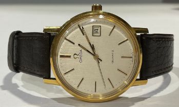 A gentleman's Omega quartz watch, champagne dial, baton indicators, centre seconds, date aperture,