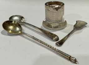 A Russian silver spoon, Moscow 1892; a silver mounted match striker or table vesta; a George III