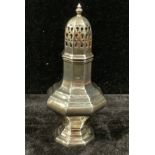 An Edwardian silver baluster sugar caster, pierced dome cover, knop finial, Birmingham 1907, 17cm