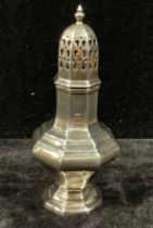 An Edwardian silver baluster sugar caster, pierced dome cover, knop finial, Birmingham 1907, 17cm