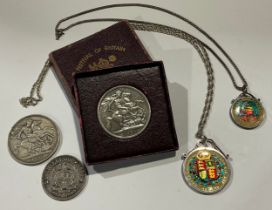 Coins - a Victoria 1889 enamelled half crown; an enamel Panama coin; an 1890 crown; a South Africa