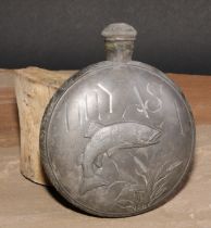 An Art Nouveau pewter hipflask, applied with a leaping fish and inscribed DRYASA, screw-fitting