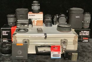 Photography; A Canon EOS 300D digital SLR camera; A Canon BG-E1 battery grip, boxed; A Canon EF S