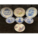 A collection of seven 18th century Delft plates, various sizes, the largest 30.5cm diameter; a