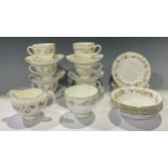 A Wedgwood Mirabelle pattern tea set, comprising six teacups, saucers and tea plates, milk and