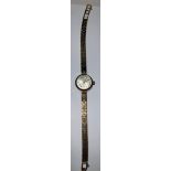 A lady's 9ct gold Avia watch, baton and Arabic numerals, integral 9ct gold bracelet strap, marked