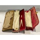 Lady's Accessories - an Edwardian leather glove box, concertina base, 34cm wide; a Victorian red