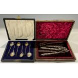 A Victorian four piece lobster set, comprising shell crackers and picks, cased; a set of six