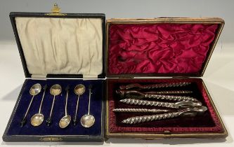 A Victorian four piece lobster set, comprising shell crackers and picks, cased; a set of six