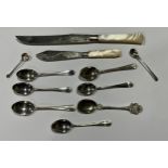 A set of four George V silver Rat Tail pattern coffee spoons, Birmingham 1929; a pair of silver