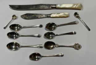 A set of four George V silver Rat Tail pattern coffee spoons, Birmingham 1929; a pair of silver