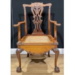 A Chippendale design mahogany commode chair, 108.5cm high, 74cm wide, the seat 54cm wide and 48cm