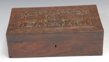 An Indian hardwood rectangular box, hinged cover carved with elephants and initials RSB, within a