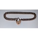 A 9ct rose gold curb link bracelet with locket, H.A&S, approximately 11g