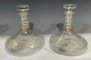 A pair of Georgian ships decanters, each with octagonal stopper, four collar neck, faceted shoulder,