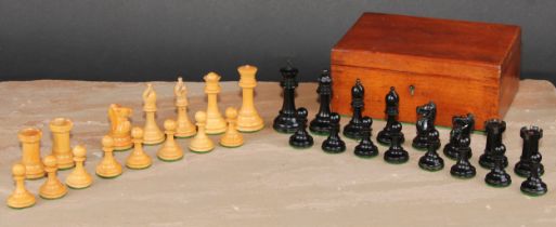 A boxwood and ebonised Staunton chess set, marked for King’s side, the Kings 7cm high, mahogany box