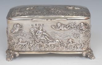 An Edwardian silver rounded rectangular dressing table casket, embossed with a Classical narrative