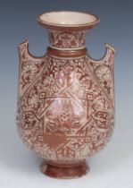 A Middle Eastern lustre vase, decorated in copper lustre in the Islamic taste, 23cm high, 19th