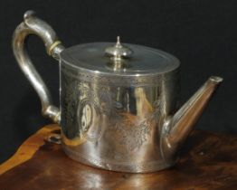 A George III silver oval drum shaped teapot, bright-cut engraved with swags and bands of