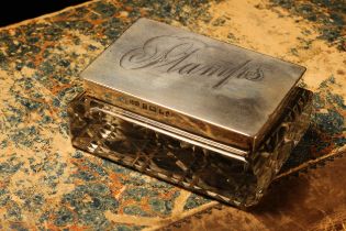 An Edwardian silver mounted rectangular hobnail cut desk top stamp box, hinged cover inscribed