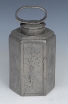 An 18th century Dutch pewter hexagonal tea caddy, wriggle-work engraved with gamekeeper and dairy
