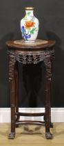 A Chinese hardwood jardiniere stand, shaped circular top with beaded border, inset marble panel,