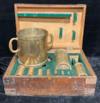 A set of early 20th century brass metric measures, 10 litres to 0.002 litres, by W & J Avery,