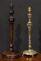 An early 20th century brass table lamp, cast after the antique with ram’s head masks, 36.5cm under