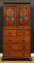 A 19th century Anglo-Indian padouk cabinet on chest, egg-and-dart cornice above a deep frieze and