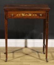 A late Victorian rosewood and marquetry games table, hinged top enclosing a chess board and a