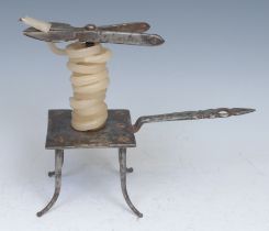 An 18th/19th century forged steel wax jack, sprung scissor action sconce, pierced shaped handle,