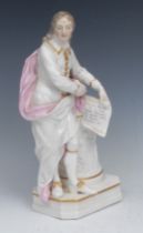 A Derby patch mark figure, of John Milton, he stands scroll in hand, wearing a puce cloak, beside