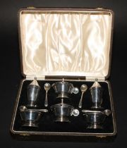 An Art Deco six piece condiment set, comprising pairs of peppers, salts and mustards, geometric
