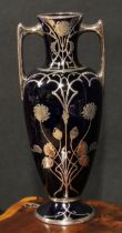 An Art Nouveau silver mounted cobalt blue ovoid vase, pierced and engraved with stylised flowers