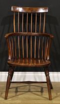 A 19th century elm and fruitwood Windsor elbow chair, stick-back with curved cresting rail, 94cm