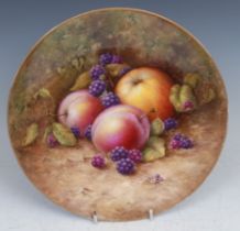 A Royal Worcester circular plate, painted by Ayrton, signed, with ripe fruit on a mossy ground, gilt